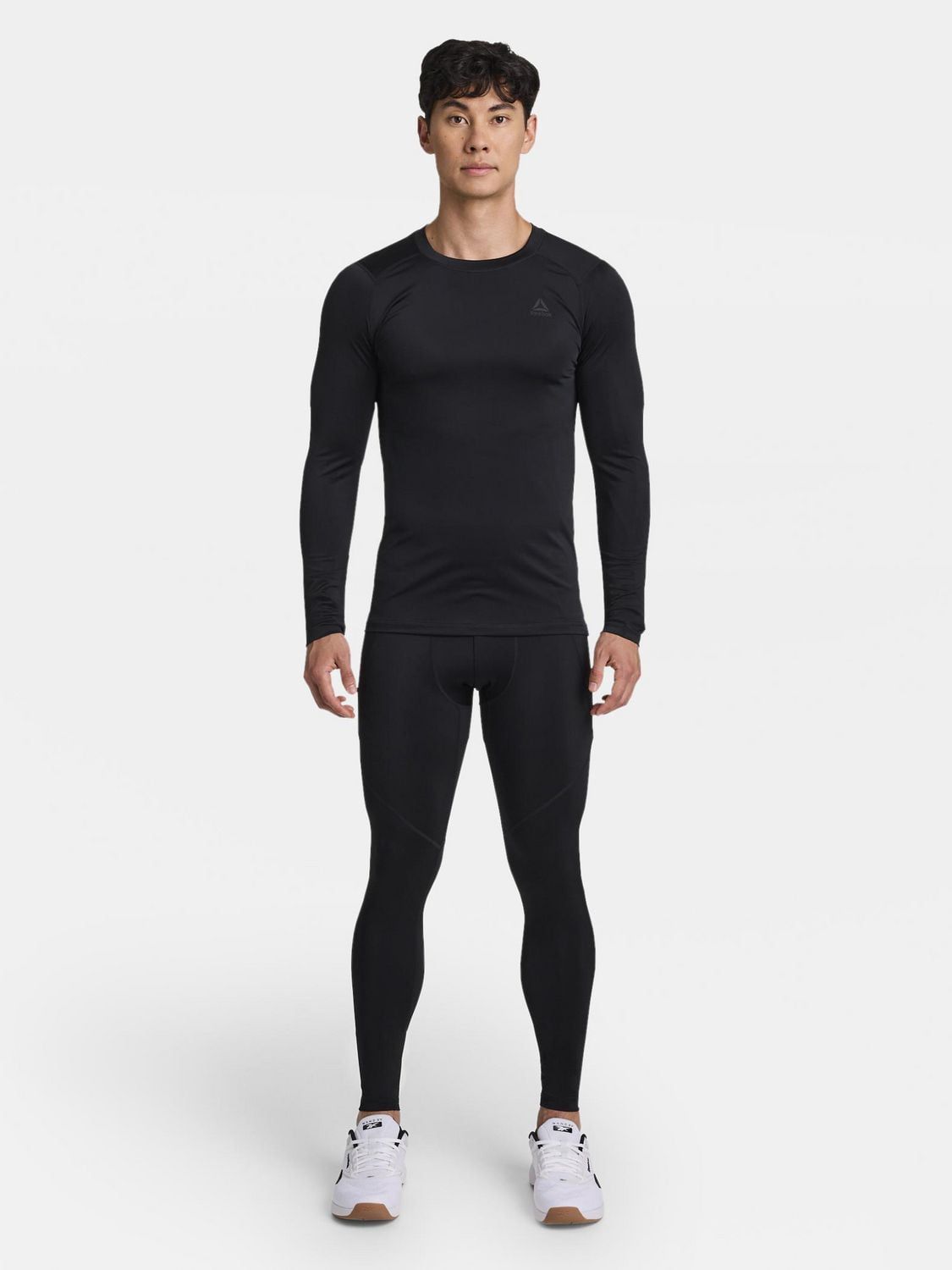 Reebok Haut de compression à manches longues et col rond pour homme