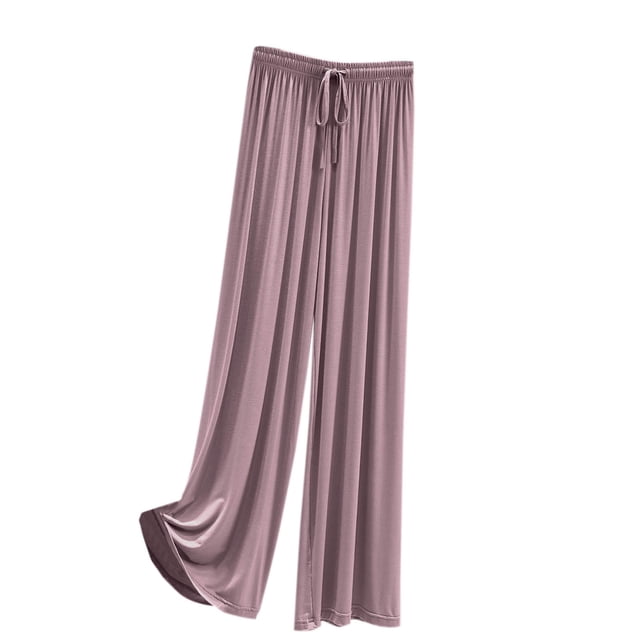 Timegard Pajamas Pants for Women featuring a wide-leg design with an elastic waistband and drawstring closure. Made from a soft and lightweight blend of 95% polyester and 5% spandex, these loose and comfy homewear pants are ideal for casual lounging or relaxing. The pants are shown in a muted mauve color with a flowy silhouette.
