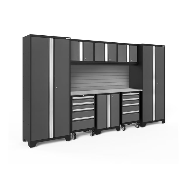 NewAge Products Bold Series 9-Piece Cabinet Set in grey, featuring heavy-duty 24-gauge steel construction. Includes 2 multi-use lockers, 2 rolling tool drawer cabinets, 1 two-door base cabinet, 3 wall cabinets, a 72-inch stainless steel worktop, and a 72-inch slatwall backsplash. The set offers lockable doors with full-length aluminum handles, full-extension drawers, and adjustable shelves for customizable storage. Rolling tool cabinets have anti-tip locking casters for mobility. Dimensions: 132 inches wide, 18 inches deep, and 72 inches high, with adjustable legs increasing height to 75.25-76.75 inches. Ideal for organizing garage tools and equipment.