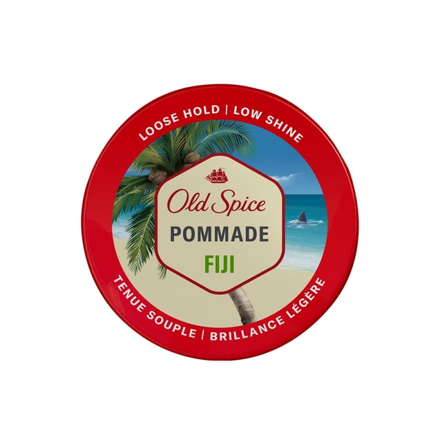 Old Spice Pommade Fiji hair styling pomade container with a red lid featuring a tropical beach scene with palm tree and ocean, labeled for loose hold and low shine, suitable for men's grooming and hair styling.