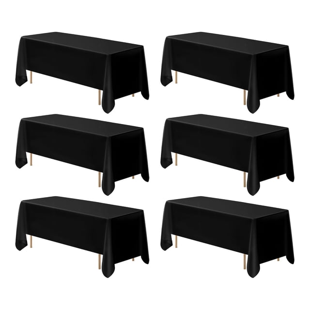 KFFKFF black tablecloths for rectangle tables, 6 pack, each measuring 70 x 120 inches. Made from wrinkle-resistant polyester fabric, these reusable and machine washable table covers are designed for 6-foot-long rectangular tables. The image shows six black tablecloths draped over rectangular tables, highlighting their smooth and polished appearance. Ideal for events like weddings, birthdays, and corporate gatherings, these tablecloths offer durability, tear resistance, and easy maintenance.