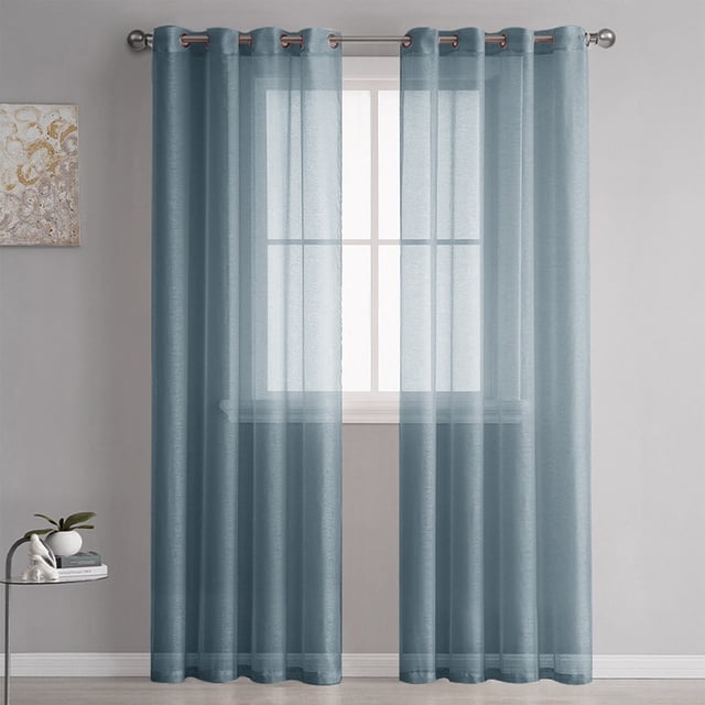 Dvkptbk Sheer Curtains Semi Sheer Curtains for Bedroom 98 Inches Long. A single navy-colored semi-sheer curtain panel made of linen, measuring 39.3 inches wide by 98.4 inches long, displayed on a window with a grommet top design. The curtain allows light to pass through, creating an airy and breathable atmosphere. Suitable for living rooms, bedrooms, or home offices, and compatible with standard or decorative curtain rods.