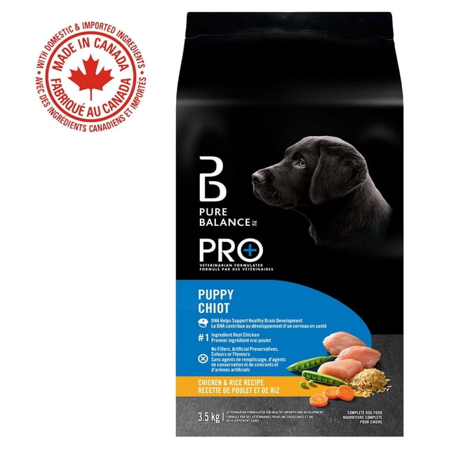Pure Balance Pro+ Puppy, Chicken & Rice Recipe dry dog food bag showing a black Labrador puppy profile on a black background, with blue and orange label highlighting real chicken as the first ingredient, DHA for brain development, no fillers or artificial preservatives, weighing 3.5 kg, made in Canada with domestic and imported ingredients.