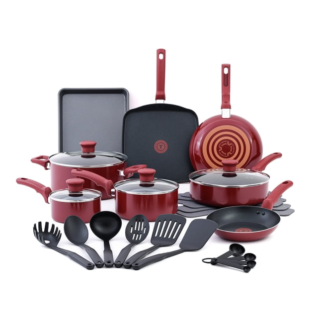 T-fal Kitchen Solutions 22-piece recycled aluminum non-stick cookware set in red, featuring frypans, saucepans with vented glass lids, square griddle, baking tray, six ergonomic black kitchen utensils, and four measuring spoons, with Thermo-Spot heat indicator and even heat base, dishwasher and oven safe.