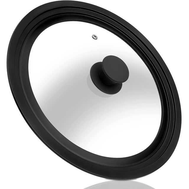 TESNN Universal Lid for Pots, Pans and Skillets, featuring a tempered glass design with a heat-resistant black silicone rim. This replacement lid fits cookware with diameters of 10 to 12 inches, including frying pans, cast iron skillets, and woks. The lid includes a vent hole for steam release and a flat design for easy storage in drawers or cabinets.