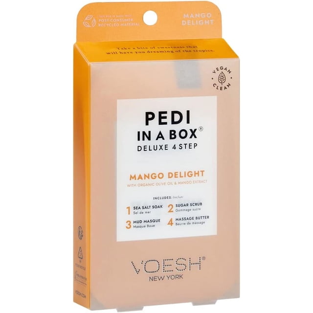 VOESH Pedi in a Box 4 Step Intensive Foot Treatment in Mango Scent. The packaging highlights the four-step pedicure process, including a sea salt soak, sugar scrub, mud masque, and massage butter. The box is orange with white accents and features text emphasizing its vegan, cruelty-free, and plant-derived ingredients. Designed for at-home pedicures, this kit offers a spa-like experience with natural mango extract for hydration and exfoliation.