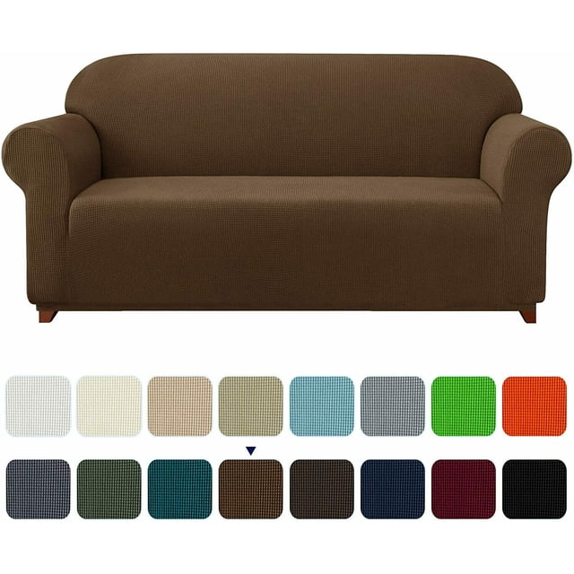Subrtex 1-Piece Stretch Sofa Slipcover Non Slip Couch Cover with a textured grid pattern in a brown colour. The slipcover is shown fitted on a three-seater sofa, highlighting its snug fit and built-in elastic corners for a semi-custom fit. Below the sofa, a selection of additional colour options is displayed, including beige, green, blue, and black. Made of 85% polyester and 15% spandex, this slipcover is soft, durable, and machine washable, ideal for protecting furniture from spills, stains, and wear. Suitable for various sofa types, including loveseats and T-cushion sofas.