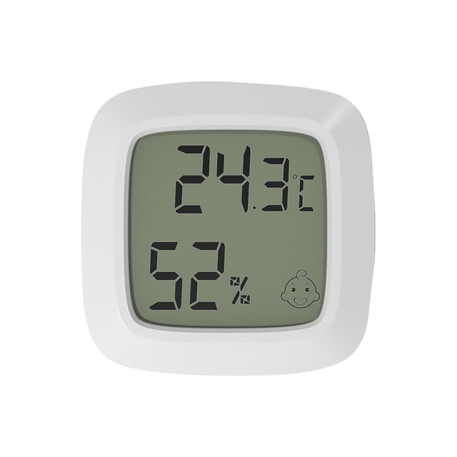 TIMIFIS Thermometer Mini Hygrometer designed for indoor use, featuring a compact white frame with a digital display showing temperature in Celsius (24.3°C) and humidity (52%). The display includes a smiling face icon for comfort indication. Equipped with magnetic absorption and double-sided adhesive for versatile placement, it is suitable for bedrooms, offices, and other indoor spaces.