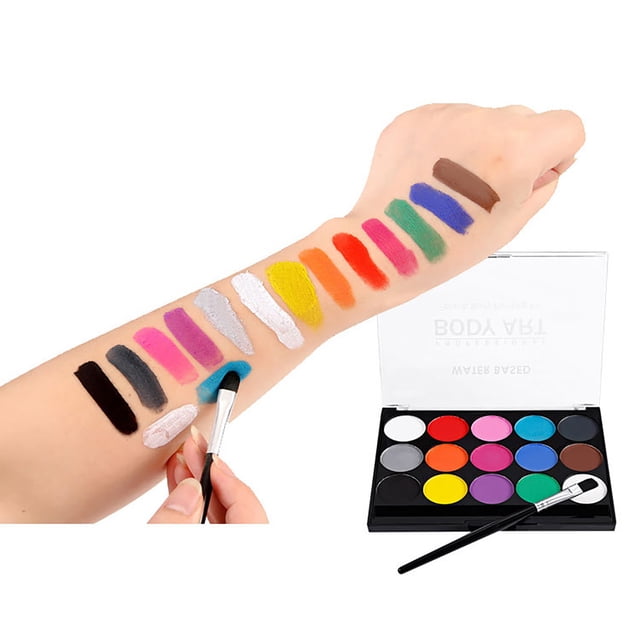 LPSSTORE Face Paint Kit with 15 Colors Party Face & Body Paint, including 15 vibrant colours and two brushes. The image displays swatches of the colours on an arm, such as black, white, pink, yellow, green, and blue, with a brush applying paint. Ideal for themed parties, fancy dress events, and sports painting.