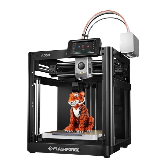 Flashforge AD5X 3D Printer, a multi-color printer for beginners and home DIY, with dimensions of 8.7 x 8.7 x 8.7 inches. The black-framed printer is shown printing a vibrant orange tiger model. Features include one-click auto leveling, ultra-fast 12X printing speed, and support for up to 4 colors simultaneously. It offers a touchscreen interface, customizable enclosure, and advanced capabilities for smooth, detailed, and high-quality prints.