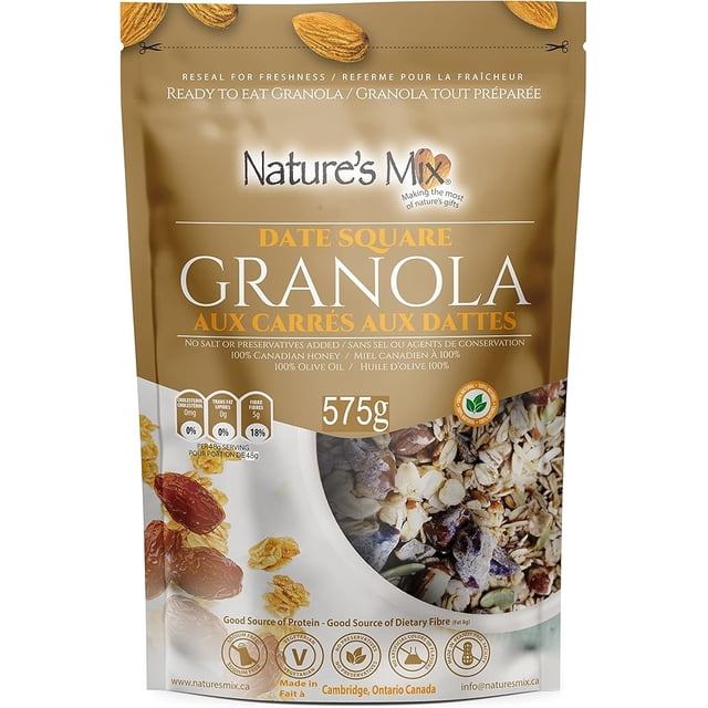 Fabriqué au CANADA - Nature's Mix Carré de Dattes Granola dans un Sac Refermable de 575 G. l'Emballage Met en Valeur Ses Ingrédients Naturels, Y Compris l'Avoine, les Amandes, les Dattes, la Pomme Séchée, la Noix de Coco Non Sucrée, le Miel, l'Huile d'Olive extra Vierge, les Graines de Citrouille et la Cannelle. Fait avec 100 % de Sirop d'Érable Canadien et d'Avoine, Il Ne Contient Pas de Sucre Transformé, de Sel Ni d'Agents de Conservation. l'Avant du Sac Présente une Fenêtre Claire Montr