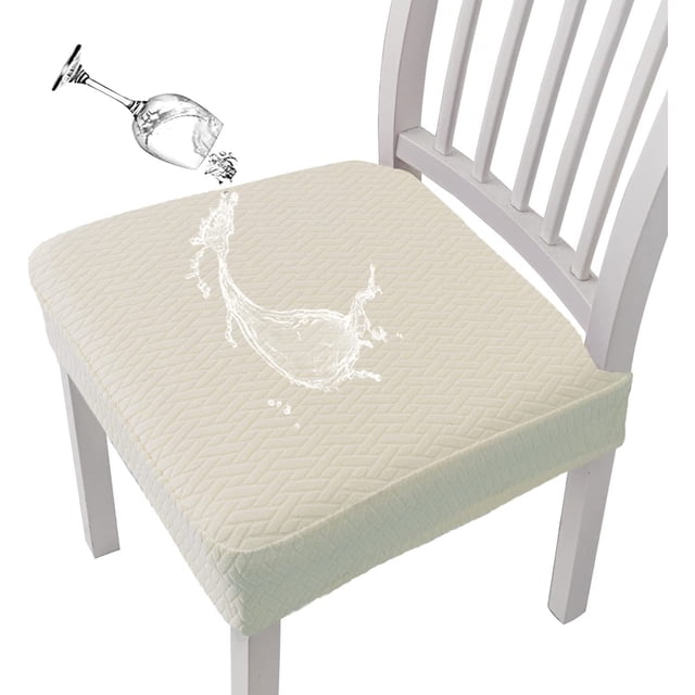 Big Savings! Stretch Chair Covers displayed on a dining chair seat in a light beige color. The textured cover highlights its water-resistant TPU membrane backing, repelling liquid spills effectively. Made from stretchy fabric for a secure fit, it is easy to install and machine washable. Ideal for dining rooms, kitchens, and events, this slipcover adds style and protection.