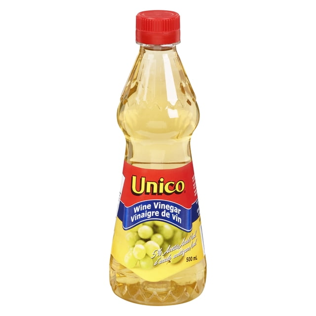 Unico White Wine Vinegar 500 ml clear plastic bottle with red cap and label featuring green grapes, used to flavour salads and side dishes with 5% acetic acid content.