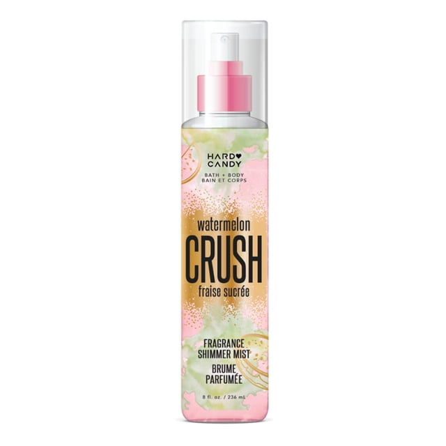 Hard Candy Watermelon Crush Fragrance Shimmer Mist in a clear 236 mL spray bottle with pink nozzle and cap, featuring pastel pink, green, and gold watermelon-themed label, designed for bath and body fragrance, ideal for a refreshing scent boost throughout the day.