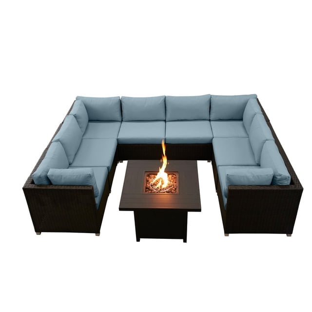 Innesbrook Collection 9-Piece Aluminum Patio Conversation Set with Spa Cushions and Square Fire Table, modular U-shaped outdoor seating with rust-resistant dark brown PE resin wicker frame, light blue five-inch thick cushions, and a central square fire table with active flame and lava rocks, suitable for patio lounging and entertaining guests.