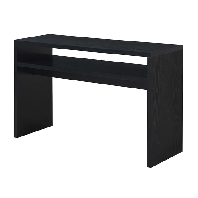 Convenience Concepts Northfield Table Console Deluxe en Fini Bois Noir. Cette Table Console Contemporaine Présente une silhouette aux Lignes Nettes avec Deux Tablettes Spacieuses pour Rangement et Exposition. Fabriquée en Panneau de Particules en Nid d'Abeille avec Placage de Mélamine, Elle Mesure 48 Pouces de Longueur, 15,5 Pouces de Largeur et 30 Pouces de Hauteur. la Finition Bois Noir Ajoute une Touche Épurée, la Rendant Adaptée à une Utilisation dans les Entrées, les Salons Ou les Bureaux à Domicile. Partie de la Collection Northfield.
