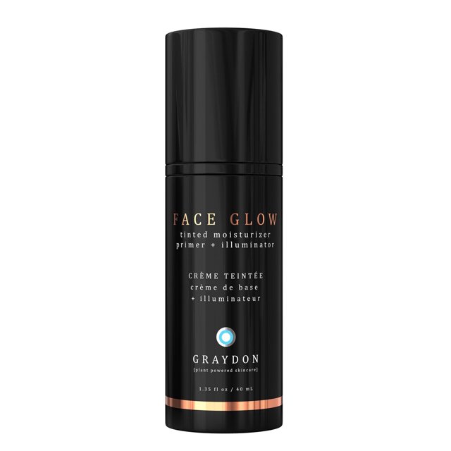 Graydon Skincare Face Glow tinted moisturizer primer and illuminator in a black cylindrical bottle with rose gold and white text, 1.35 fl oz (40 mL), designed to brighten and highlight skin for a radiant, dewy complexion and a natural no-makeup look.