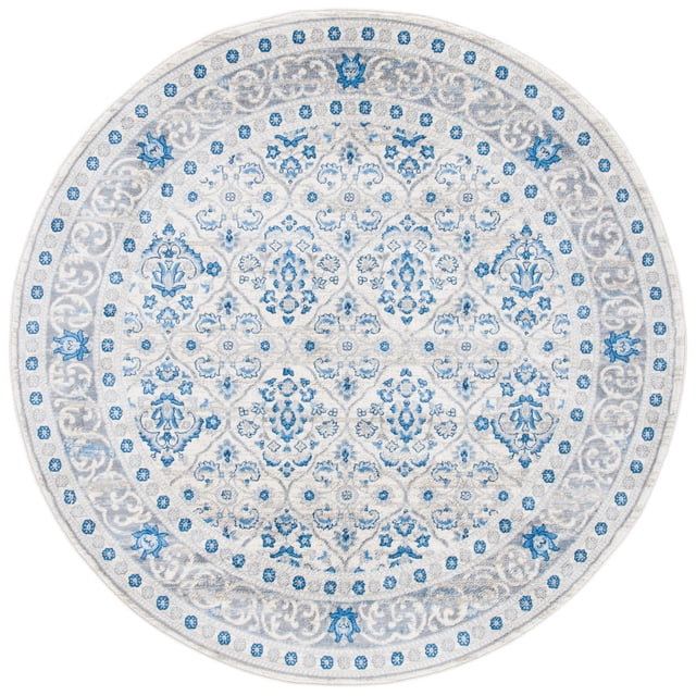 SAFAVIEH Brentwood Naomh Geometric Area Rug, a round accent rug with a close cut pile made of soft synthetic yarns, featuring a blue and grey floral geometric pattern on a light background, suitable for traditional and transitional decor.