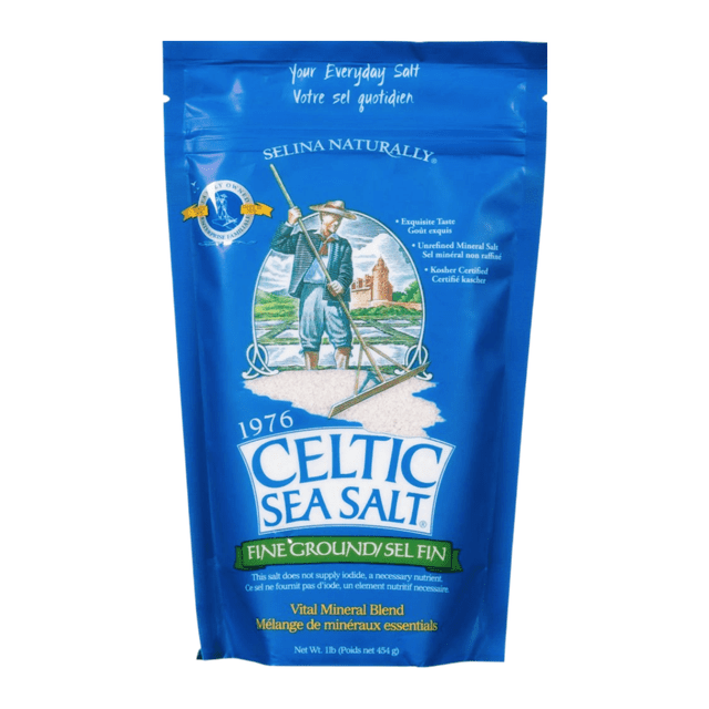 Celtic Sea Salt Fine Ground - Vital Mineral Blend in a 1 lb (454 g) resealable blue bag. The packaging features a farmer illustration, the brand name prominently displayed, and bilingual text highlighting its unrefined mineral salt, exquisite taste, and kosher certification. Suitable for baking, seasoning, and everyday use.