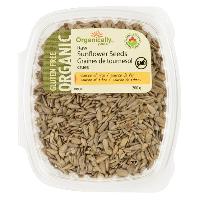 Organically Yours Organic Sunflower Seeds in a clear plastic container with a beige label showing gluten-free, raw seeds, 200 g weight, and non-GMO certification, highlighting its organic source of iron and fibre, suitable for healthy snacking or adding to meals.