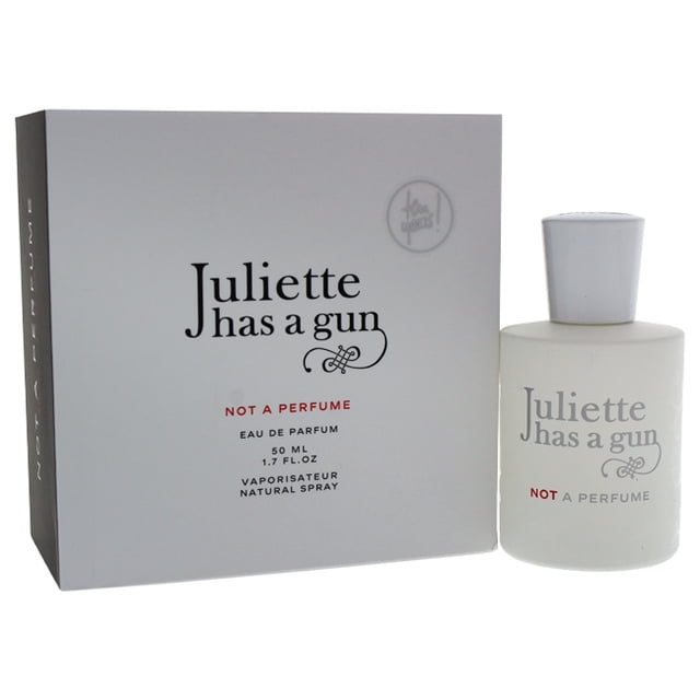 Not A Perfume by Juliette Has A Gun for Women - 1.7 oz EDP Spray. Front-facing spray bottle with simple label and atomizer, featuring ambroxan notes in a refreshing oriental woody eau de parfum for casual wear and long-lasting scent; often used to lightly refresh scarves or linens when traveling.