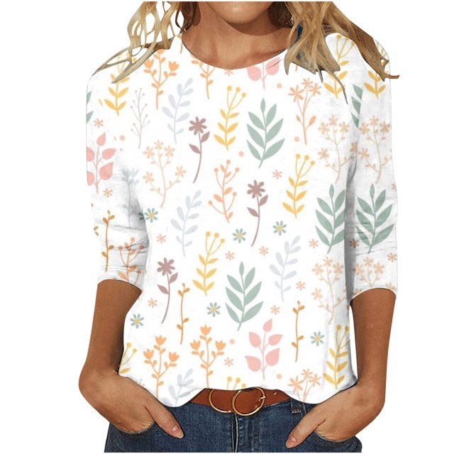 IROINNID T-Shirt à Manches Longues en Polyester Réduit pour Femmes en Kaki, avec Col Rond et design de Chemisier Mi-Long. le T-Shirt Coupe Ample avec Imprimé floral en Couleurs pastel, Incluant Jaune, Rose et Vert. Fabriqué en Matériau Polyester Doux, Il Convient au Port Quotidien et Offre Confort et Durabilité. Idéal comme Chemisier Décontracté pour Femme Ou Haut Confortable pour Femme, le Modèle Agence le T-Shirt avec des jeans Bleus et une Ceinture Brune.