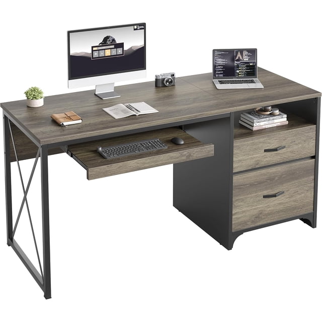 Bestier 55 inch Computer Desk with Drawers Keyboard Tray Home Office Desk featuring a spacious 55-inch weathered gray oak desktop supported by a sturdy black metal frame with X-crossbar reinforcement. The desk includes a pull-out keyboard tray, two side drawers, and a cubby shelf for organized storage of office supplies and files. Ideal for home offices or living rooms, the desk combines industrial style with functionality.