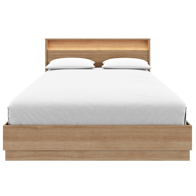 Harlow Bed Set with Slatted Bedframe and Headboard with Integrated Light showing a front view of a Canadian-crafted platform bed in light brown oak engineered wood with a textured melamine finish, white bedding, and a modern headboard with a dimmable integrated plug-in light and small shelf, designed for mattresses 8 to 12 inches high without a box spring.