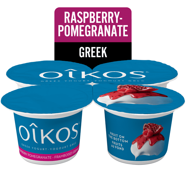 Oikos Greek Yogurt Raspberry-Pomegranate Fruit on the Bottom 2% M.F. four-pack with blue containers featuring white Oikos branding and raspberry-pomegranate fruit illustration, containing 8 grams of protein per 100g and made with 100% Canadian milk, suitable for convenient and healthy snacking.
