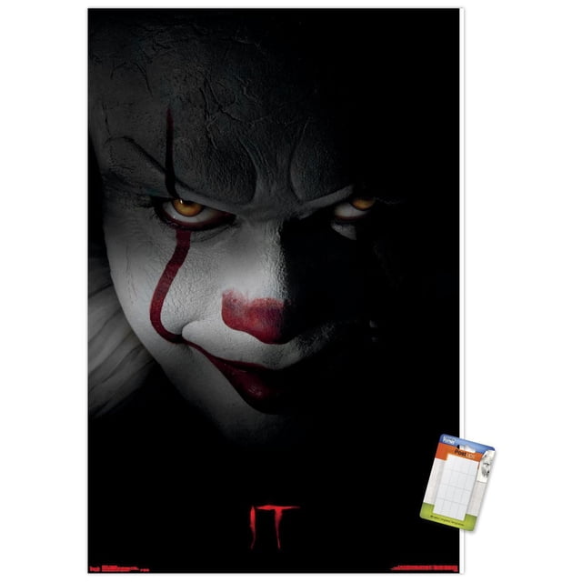IT - Pennywise Wall Poster, 22.375" x 34" framed wall art featuring a dark background with red stylized 'IT' text near the bottom, ideal for home décor and movie poster collections.