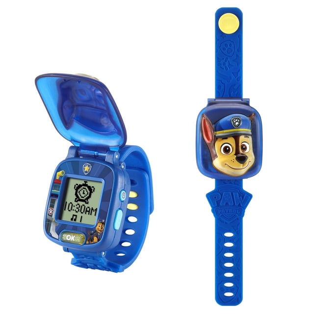 VTech PAW Patrol Learning Pup Watch - Chase with Games and Time Tools - English Version in blue with a 3D Chase figure on the flip cover. The digital screen displays 10:30 AM and includes 12 clock faces, stopwatch, timer, alarm with selectable tones, and four educational games. The blue adjustable strap features embossed PAW Patrol logos and patterns, designed to build matching, math, and problem-solving skills for kids aged 3 to 6.