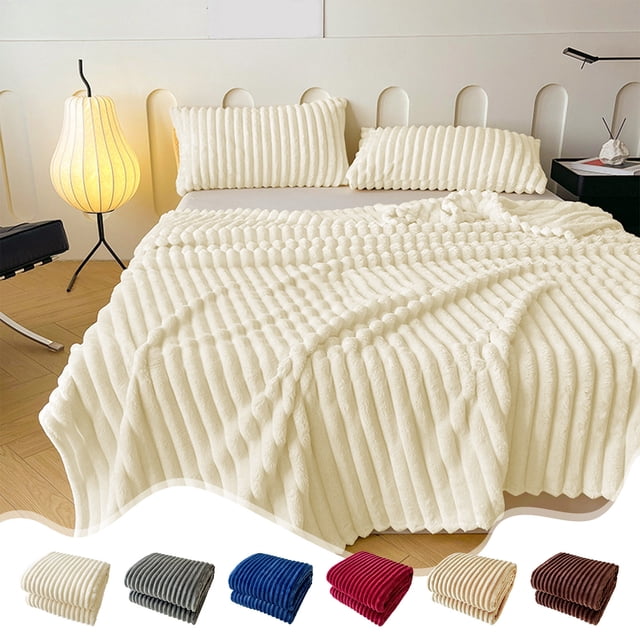 Gspmoly Flannel Fleece Throw Blanket in beige, displayed on a bed with matching ribbed pillows. The lightweight and soft blanket features a striped ribbed texture, suitable for couches, beds, or sofas. Additional color options, including grey, blue, red, and brown, are shown at the bottom. Made of polyester, it measures 150x100cm and is ideal for all-season use.