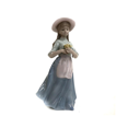thumbnail image 1 of Farm Girl Holding A Flower Figurine, 1 of 1