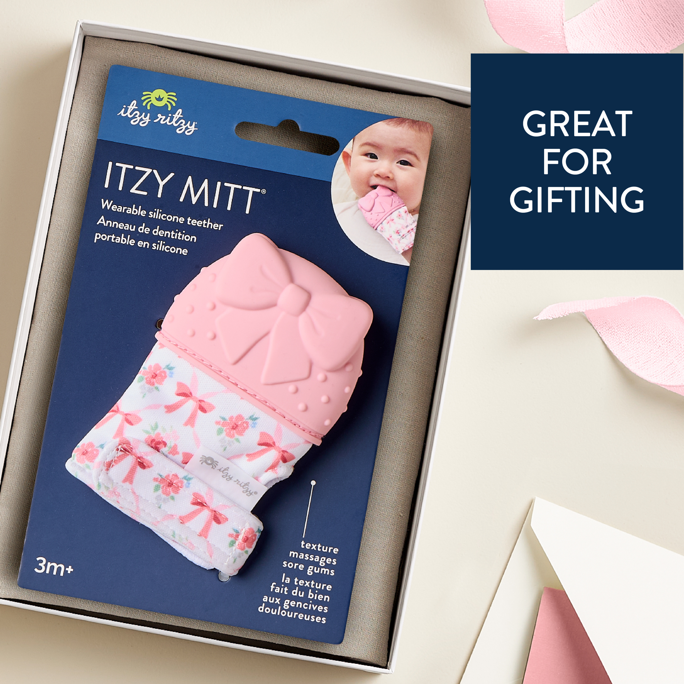 Itzy Ritzy Itzy Mitt™ Bow Silicone Teether for Infants, 0+ Months