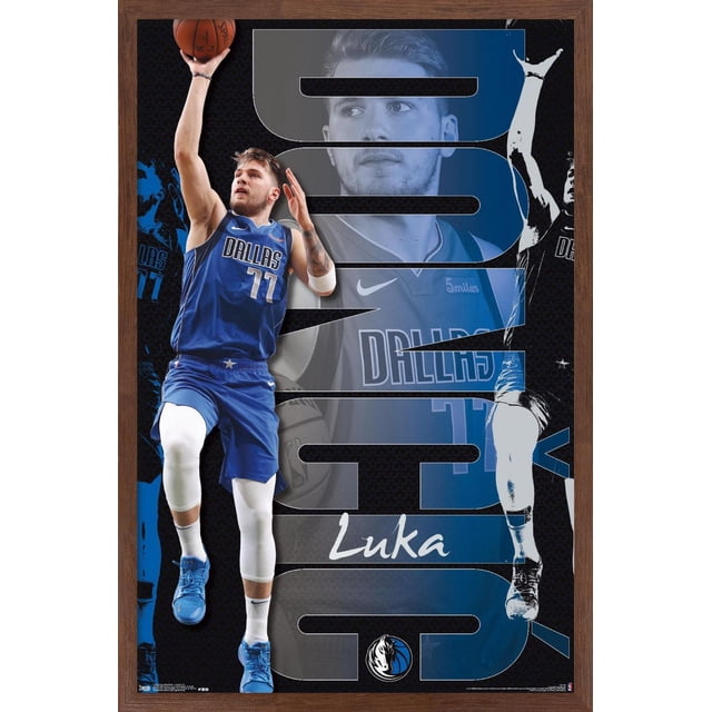 NBA Dallas Mavericks - Luka Doncic 19 Wall Poster, 22.375" x 34" depicting Luka Doncic in a blue Dallas Mavericks jersey number 77 jumping to shoot a basketball, with a large stylized 'DONCIC' text and the Dallas Mavericks logo at the bottom, printed on glossy poster paper suitable for bedroom, office, or dorm wall decor.