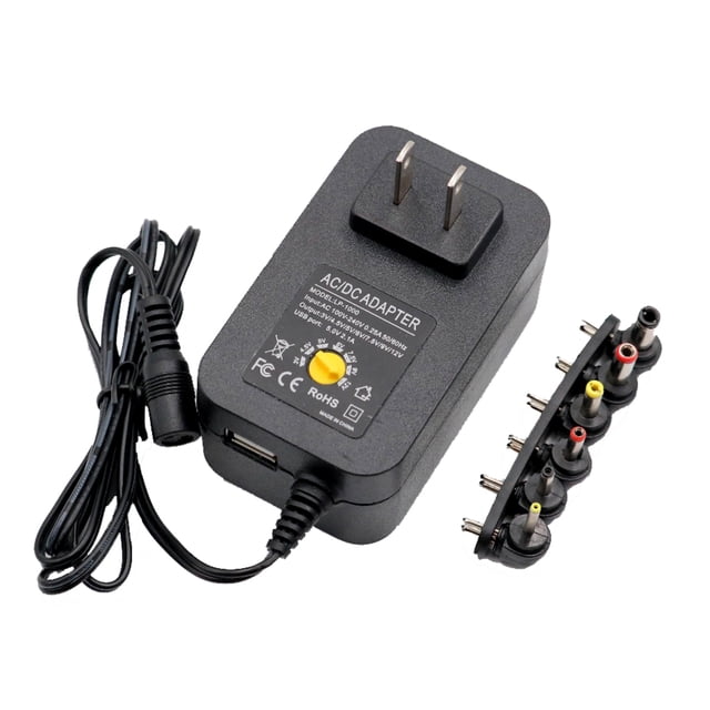 Adaptateur CA/CC 3V 4,5V 5V 7,5V 9V 2A 2,5A Réglable, Adaptateur d'Alimentation Universel 30W Noir, Doté d'Un Interrupteur Manuel de Réglage de Tension et de six Embouts de Connecteur Interchangeables. Conçu pour la Compatibilité avec Divers Appareils Électroniques comme les Téléphones Mobiles, les Ordinateurs et les machines de Jeu. Comprend un Câble de 1,1 Mètre et Prend en Charge une Tension d'Entrée de 100-240 Vc. l'Adaptateur Est Fabriqué en ABS et Matériaux Ignifug