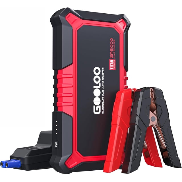 GOOLOO Car Jump Starter,2000A Peak 12V GP2000 Portable Jumper Pack for Up to 8.0L Gas and 6.0L Diesel Engines, Auto Lithium Battery Booster Power Bank SuperSafe front-facing compact black 2000A jump starter with textured matte shell, visible BOOST and power buttons, heavy-duty red and black jumper clamps, three USB ports including USB-C quick-charge, and built-in 400-lumen LED flashlight. Suitable for emergency vehicle starts and charging phones or tablets while camping.