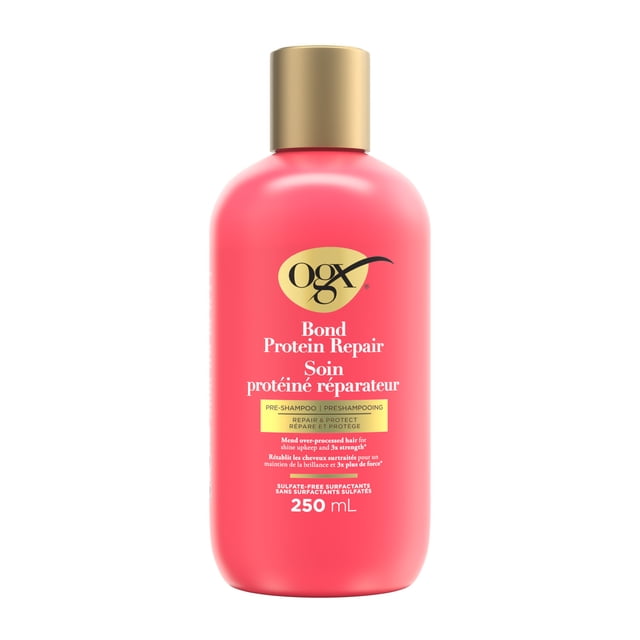 OGX Bond Protein Repair Pre-Shampoo 250mL in a front-facing pink bottle with a gold cap, a hair treatment that strengthens and repairs over-processed hair, protects against frizz, and maintains shine with a sulfate-free formula, suitable for weekly use before shampooing.