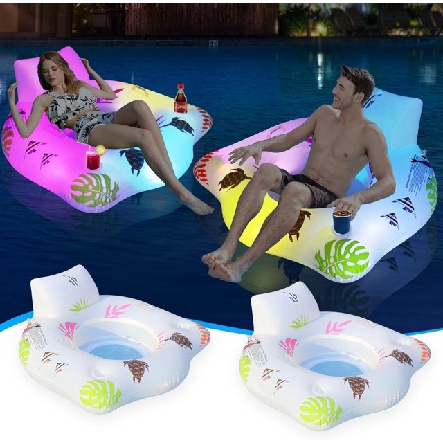 FANNGYX 2 Pack Solar Pool Floats with Color-Changing Lights, featuring premium inflatable loungers with 2 cup holders and handles. These oversized pool rafts for adults are shown illuminated in a pool setting at night, with vibrant color-changing lights. The floats have a tropical design with leaf and turtle patterns, a mesh bottom, and backrests for added comfort. Two additional uninflated floats are displayed in the foreground, highlighting their design and features.