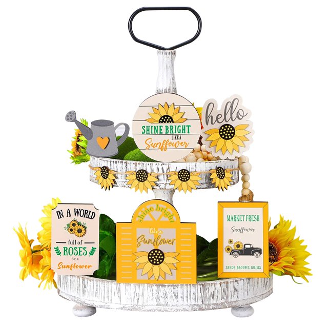 Riforla Summer Hierarchical Tray Decorative Set featuring a two-tiered wooden tray with a rustic whitewashed finish. The tray is adorned with sunflower-themed decorations, including signs with phrases like 'Shine Bright Like a Sunflower' and 'Market Fresh Sunflower,' a small watering can, and beaded garlands. The vibrant yellow and green accents create a cheerful summer aesthetic, ideal for farmhouse-style kitchen or dining table decor.