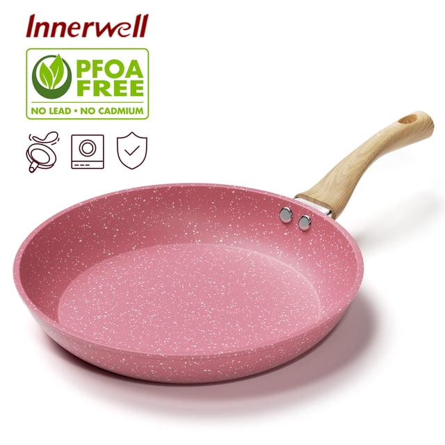 Innerwell 11 Inch Pink Nonstick Frying Pan Skillet with Bakelite handle, featuring a toxin-free ultra non-stick granitic coating and a durable, fast-heating base. The ergonomic wood-grain handle is lightweight and heat-resistant, securely attached with double rivets. Suitable for various stoves, including induction, gas, and electric. The attractive pink design adds a modern aesthetic to kitchen cookware. Ideal as a saute pan for frying fish, beef, chicken, and bread, and easy to clean with a simple wipe or rinse.