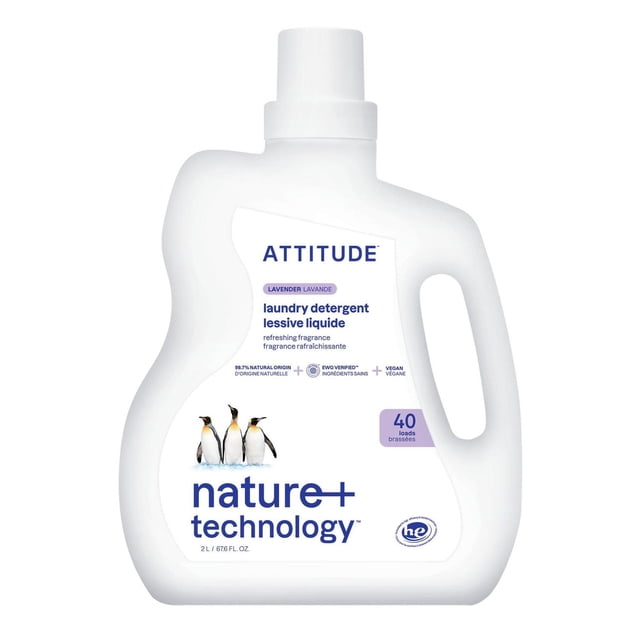 ATTITUDE nature+ technology laundry detergent lavender 40 loads in a 2L white bottle with ergonomic handle, featuring a label with three penguins, 98.7% natural origin, vegan formula, and HE washer compatibility.