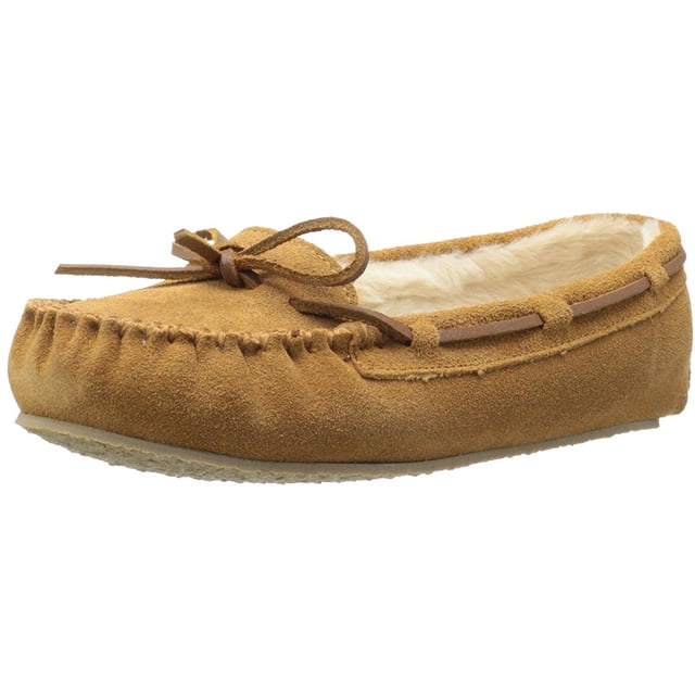 Minnetonka Womens Cally Slipper in cinnamon color, size 9 M US. This moccasin-style slipper features a suede leather upper with a faux fur lining for warmth and comfort. It has a synthetic sole with a thin rubber outsole for light traction and a 0.25-inch heel. The design includes a leather tie and around-the-collar lacing for a classic look.