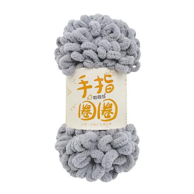 5PCS=500g Puffy Finger Loop Chunky Giant Chenille Yarn for crochet and hand knitting, shown in a soft gray color. Made of 100% polyester, this eco-friendly and comfortable yarn features finished loops for easy finger knitting without the need for needles or hooks. Each ball weighs approximately 100g, with a total of 500g across five balls. Ideal for creating baby blankets, scarves, and hats.