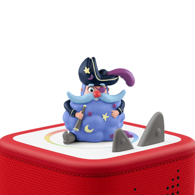 Tonies Calm Captain Dreambeard Audio Figurine showing a multicolour pirate character with a blue mustache, red nose, and purple feathered black hat, sitting on a red and white Toniebox speaker base for educational electronics for kids, promoting mindfulness and screen-free entertainment.