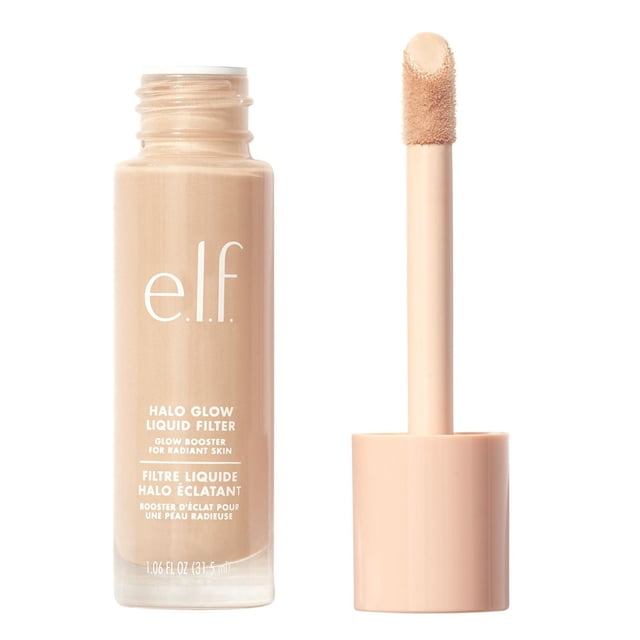 e.l.f. Cosmetics Halo Glow Liquid Filter in a clear glass bottle with white text, showing a beige liquid complexion booster and sponge-tip applicator wand, enriched with squalane and hyaluronic acid for radiant, hydrated skin, ideal for use alone or with makeup.