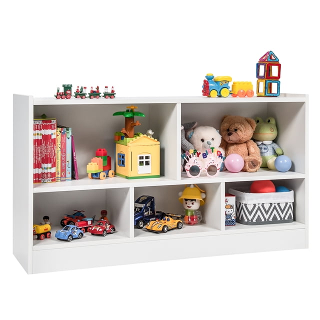 Costway Kids 2-Shelf Bookcase 5-Cube Wood Toy Storage Cabinet Organizer in white. The bookcase features five spacious compartments of varying sizes, filled with toys, books, and decorative items. The elevated bottom and kid-friendly height make it ideal for children to access and organize their belongings. Made of engineered wood, it includes reinforced back buckles and anti-slip pads for stability. Suitable for playrooms, living rooms, or classrooms.