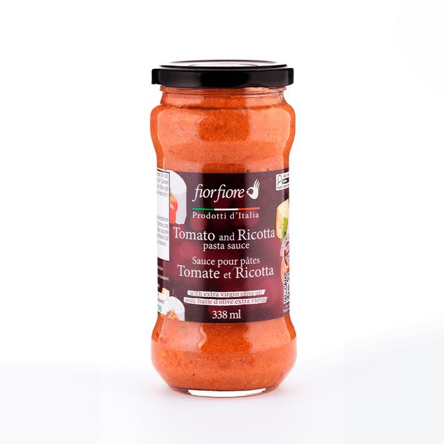 Fiorfiore Tomato and Ricotta Pasta Sauce 338ML in a clear glass jar with a black lid, featuring a label in English and French that highlights its blend of tomato, ricotta, and extra virgin olive oil, ideal for enhancing traditional Italian pasta dishes and quick meals.