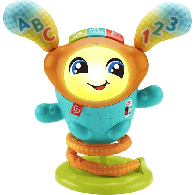Fisher-Price DJ Bouncin’ Beats baby musical toy with a smiling illuminated yellow face, turquoise body, and orange ears printed with ABC and 123, set on a green base with a motorized orange spring for bouncing, featuring 3 Smart Stages learning levels and buttons for music, sounds, and English/French language selection.