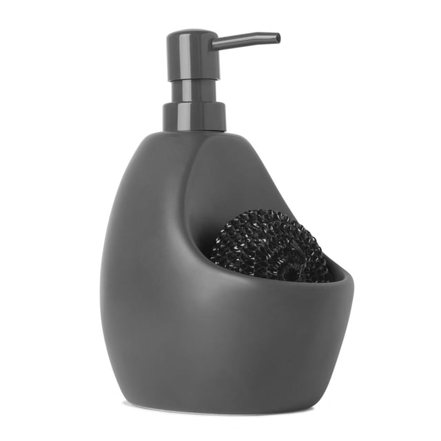 Umbra Joey Soap Pump in grey matte ceramic with built-in caddy holding a black scrubby, designed for kitchen or bathroom countertops, featuring easy one-handed pump operation and compact 4 x 5 x 8 inch size, also suitable for storing small essentials like hair clips or dental floss.